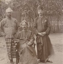 Two unidentified International Drillers with Indigenous man